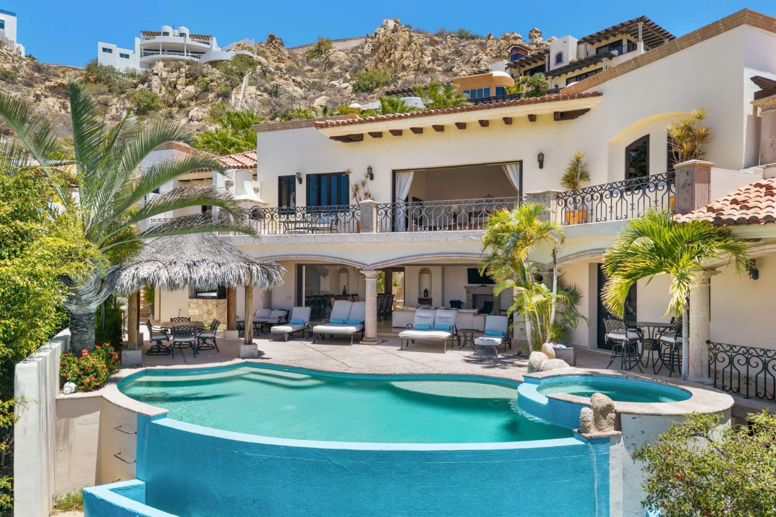 Four Seasons Cabo Section 1- Las Colinas A striking contemporary estate set atop the coveted Colinas hillside in Querencia, this new construction residence captures sweeping for sale