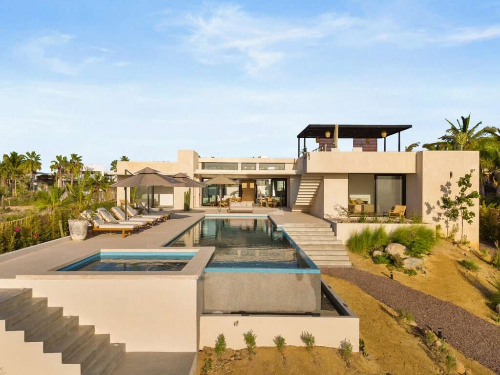 Four Seasons Cabo Las Tunas The Nacuii Residence is a refined luxury home crafted to exceed the expectations of even the most discerning buyer. Nestled on a generous and private 3,000 m² lot (0.73 acres), it's just a short, effortless stroll to the untouched, sandy shores of Las Tunas — perfect for enjoying the serene coastal landscape and dramatic sunsets. The home offers a thoughtful layout with 3 spacious bedrooms, a separate studio, a cozy TV lounge, and 6 full bathrooms, including two principal suites, a guest room, a detached studio, and a dedicated media or family room. Expansive sliding glass doors invite natural light throughout the interiors while showcasing tranquil garden – Calle Colibri, Pacific, BS