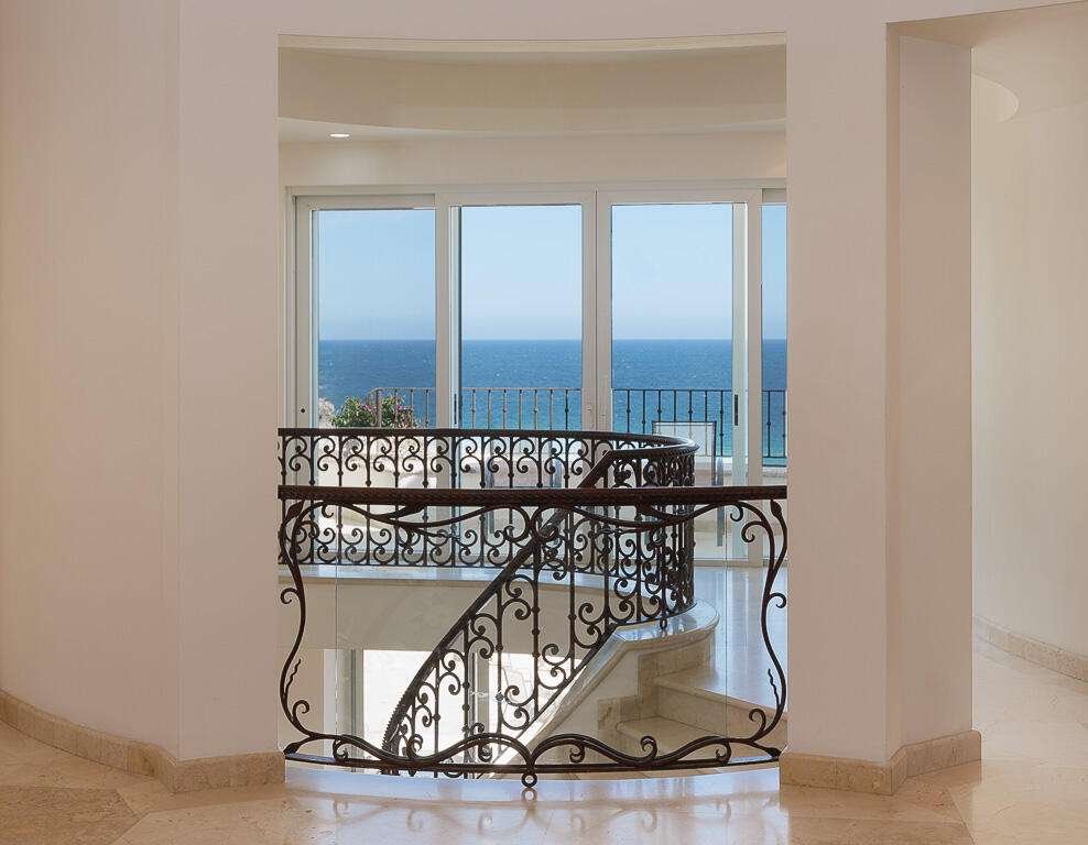 Four Seasons Cabo Pedregal Csl Villa Marcella sits on an exquisite piece of ocean front property in the exclusive community of Pedregal in Cabo San Lucas. This 6 bedroom 9 bathroom beach estate has a very private location with it's natural mountainside to it's left that make it perfect for entertaining large beach parties, family gatherings, it has even been known to host quite a few a weddings. The beach estate consists of outdoor fire pit, Olympic size swimming pool, jacuzzi, outdoor cooking area, indoor game and bar room accessible from the beach. Enjoy the long beach walks and beautiful Pacific sunrises and sunsets from this beach home. Excellent INVESTMENT property or private home on the beach. for sale
