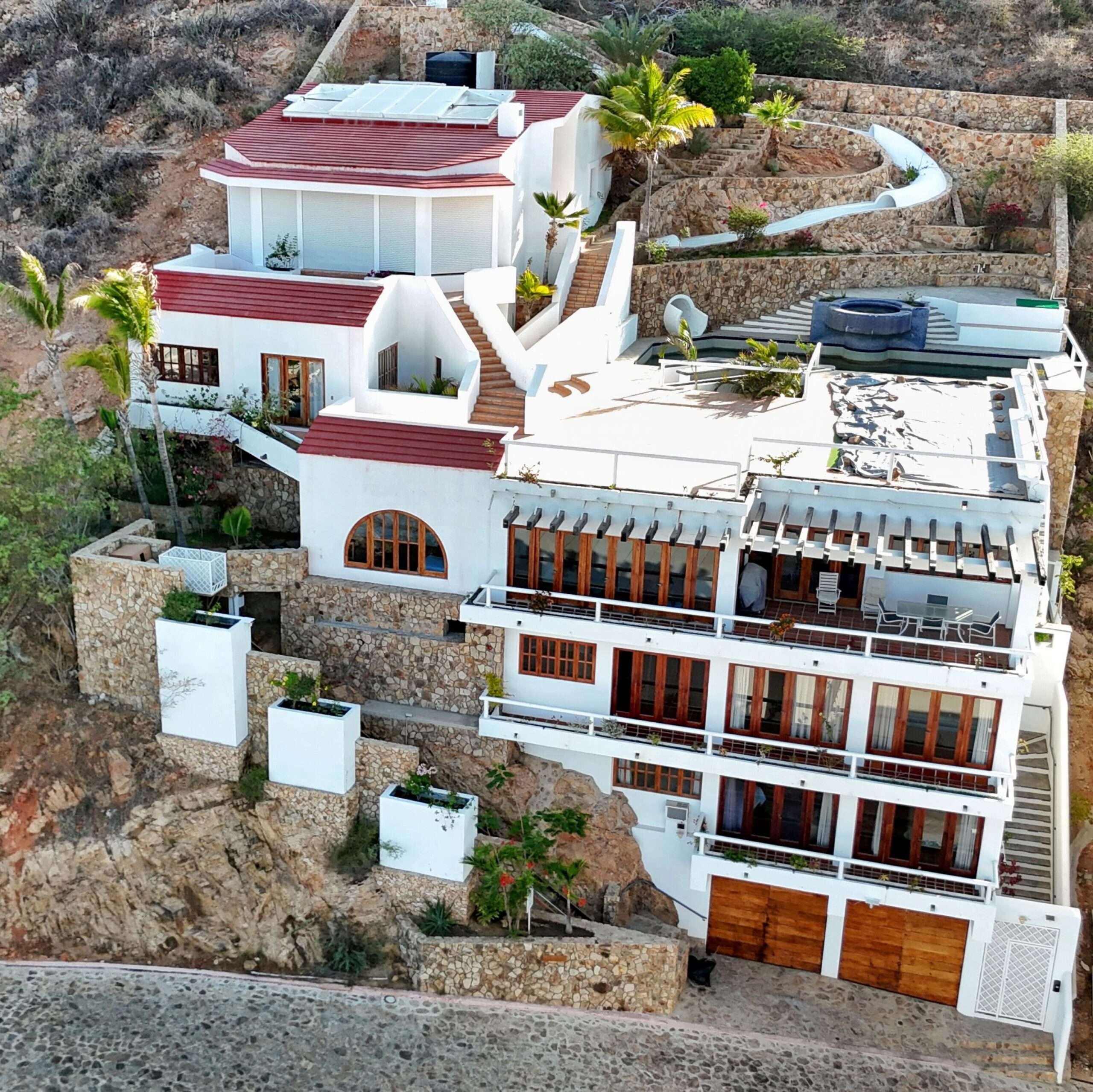 Four Seasons Cabo Pedregal Csl Perched high above the marina and the Sea of Cortez, this extraordinary 10,000-square-foot estate is one of Pedregal's most iconic residences. Carved into the granite hillside, the property represents a remarkable piece of Cabo San Lucas history and offers an architectural experience unlike any other in Los Cabos.Panoramic for sale