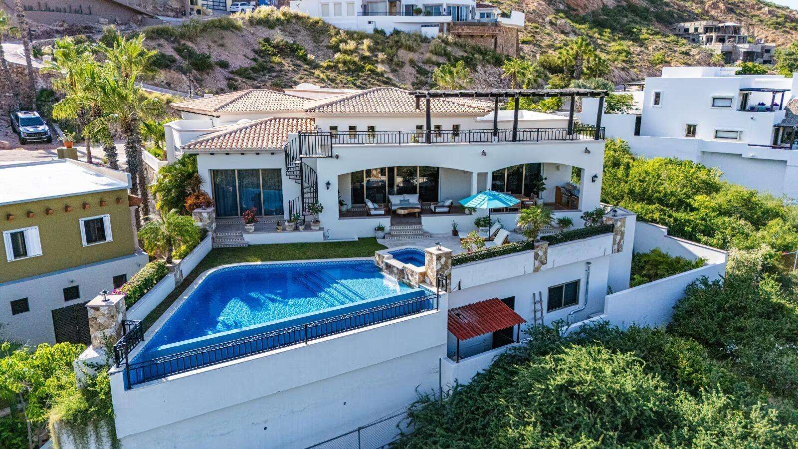 Four Seasons Cabo Cabo Colorado Architectural Elegance & Split-Wing Layout.This home is a triumph of modern architecture, beautifully finished with gorgeous marble floors throughout and premium granite countertops.A Grand Welcome: A generously sized entry foyer warmly ushers you into the home, setting a tone of spacious elegance from the very moment you arrive.Open-Concept Living: The main living room features dramatic vaulted ceilings, creating a grand, airy atmosphere. Sliding doors in both the living and dining room offer a seamless transition to the pool and outdoor deck while framing spectacular ocean – 8, Villa Ocho, San Jose Corridor, San Jose Corridor, BS